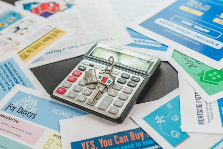 Calculator and house keys for first-time buyer advice in Kenya