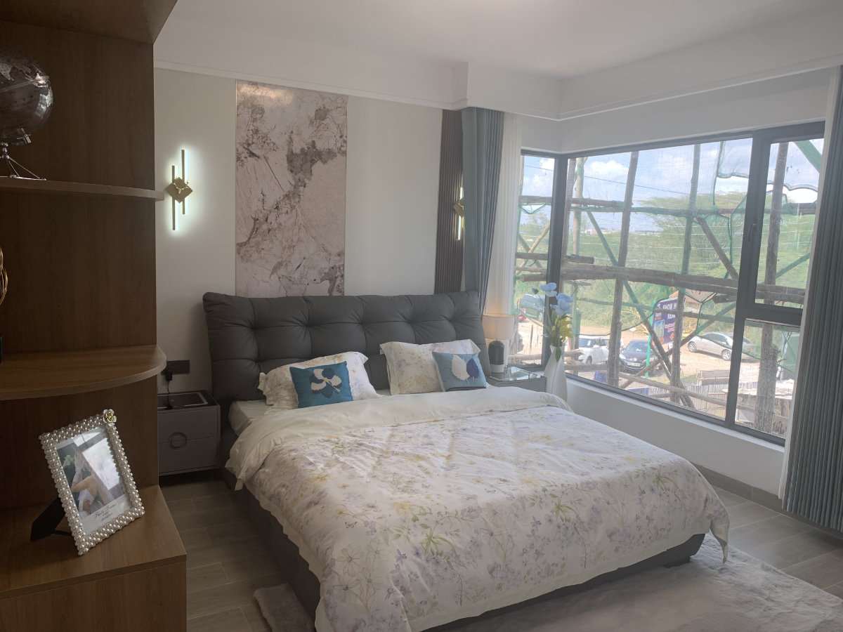 Exterior view of 3 bedroom apartment development for sale in Syokimau, Nairobi overlooking Nairobi National Park