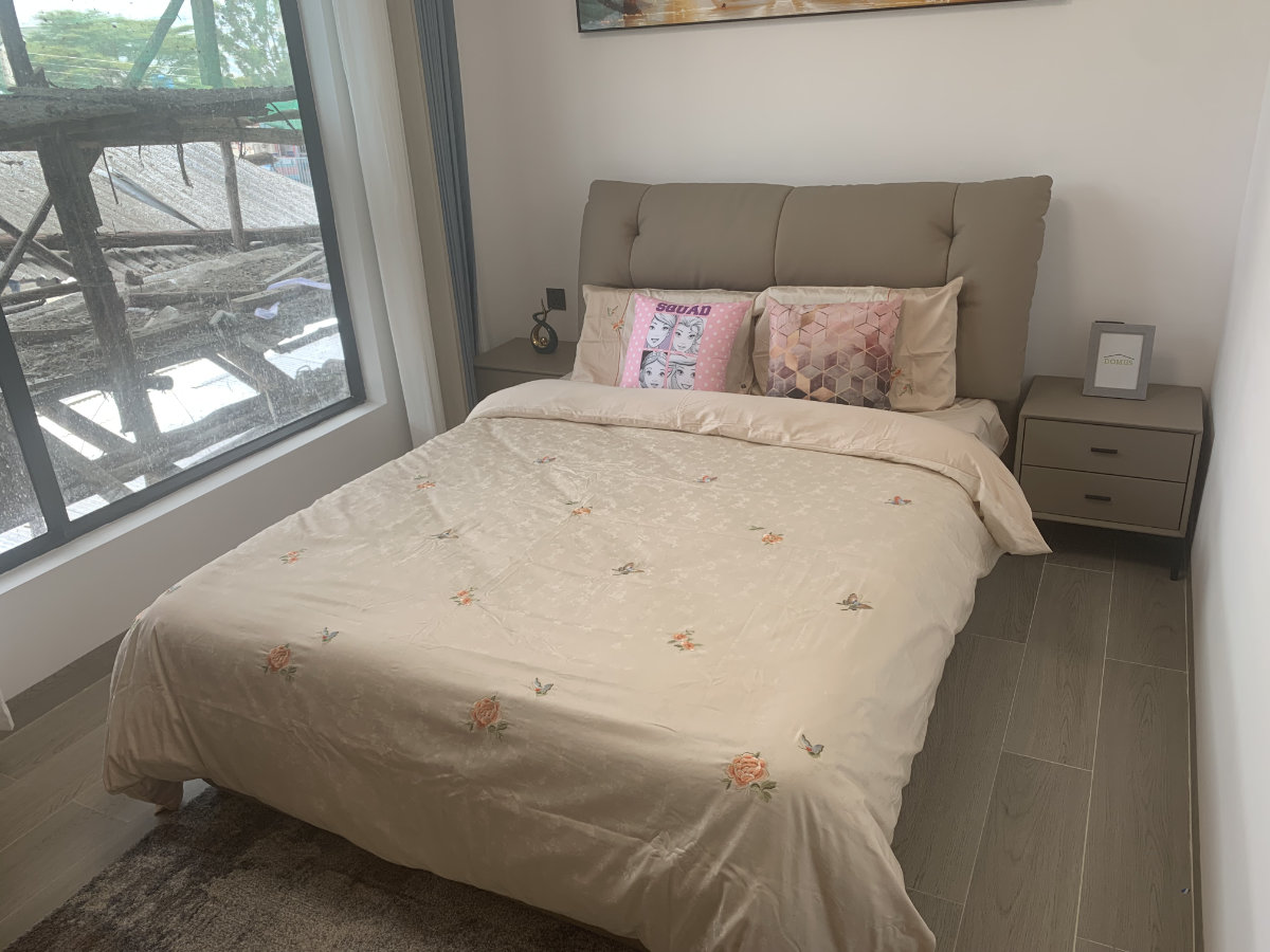 Exterior view of mini 2 bedroom apartment development for sale in Syokimau, Nairobi overlooking Nairobi National Park