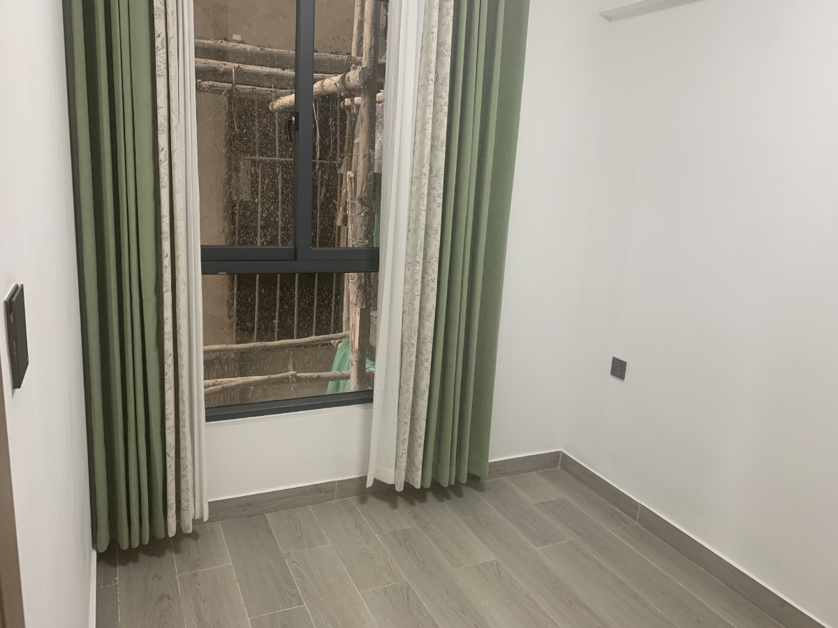 Exterior view of mini 2 bedroom apartment development for sale in Syokimau, Nairobi overlooking Nairobi National Park