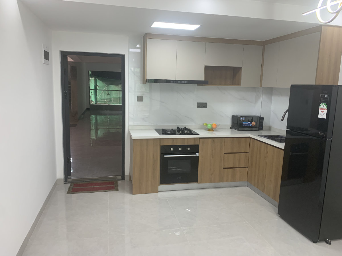 Exterior view of mini 2 bedroom apartment development for sale in Syokimau, Nairobi overlooking Nairobi National Park