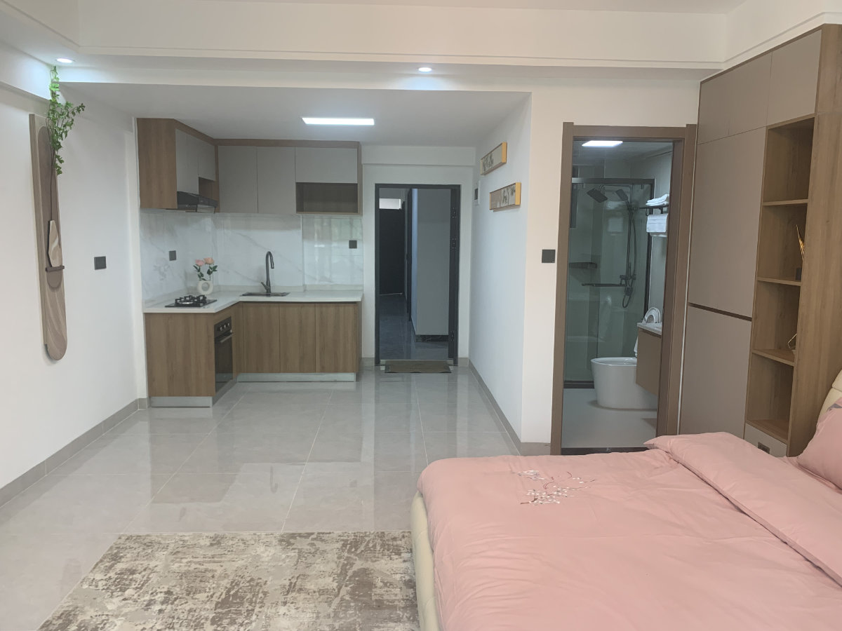 Exterior view of studio bedroom apartment development for sale in Syokimau, Nairobi overlooking Nairobi National Park