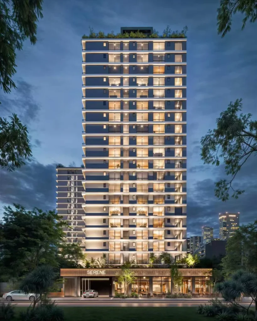 Serene Manor Kilimani tower exterior at dusk showing illuminated balconies, rooftop greenery and ground floor entrance on Turbo Road Nairobi