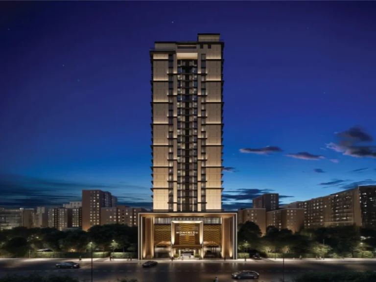 "Montbleu Westlands tower exterior at twilight showing modern architectural design, illuminated entrance, contemporary facade, residential units, and Westlands location setting"